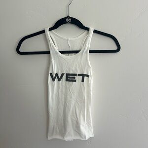 Yeezy white tank top says Wet on it.